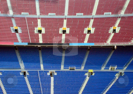 To use this stock image in your creative project, please select the size you need over to the right and click the "Add to Cart" button.
Your downloaded image will come with the Cutcaster watermark removed so don’t worry about the watermark you see on this page. Rows of seating in stadium stock photo, Rows of seating in stadium, Nou Camp, Barcelona, Spain. by Martin Crowdy