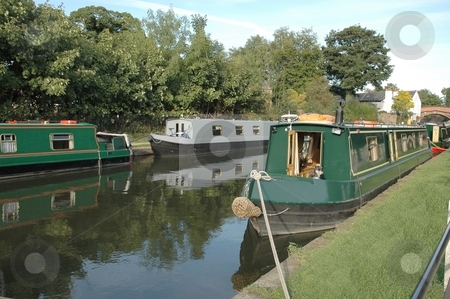 To use this stock image in your creative project, please select the size you need over to the right and click the "Add to Cart" button.
Your downloaded image will come with the Cutcaster watermark removed so don’t worry about the watermark you see on this page. Narrowboat Rally stock photo, Narrowboat narrow boat canal water leisure scenic view countryside village by Ray Roscoe