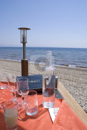 To use this stock image in your creative project, please select the size you need over to the right and click the "Add to Cart" button.
Your downloaded image will come with the Cutcaster watermark removed so don’t worry about the watermark you see on this page. Table for two stock photo, Restaurant on the beach in French Riviera. by Serge VILLA