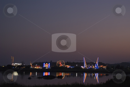To use this stock image in your creative project, please select the size you need over to the right and click the "Add to Cart" button.
Your downloaded image will come with the Cutcaster watermark removed so don’t worry about the watermark you see on this page. Amusement park stock photo, Amusement park during a summer time. by Serge VILLA