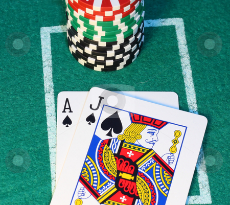 To use this stock image in your creative project, please select the size you need over to the right and click the "Add to Cart" button.
Your downloaded image will come with the Cutcaster watermark removed so don’t worry about the watermark you see on this page. Blackjack close up. stock photo, Blackjack and a stack of chips on a felt background by Steve Stedman