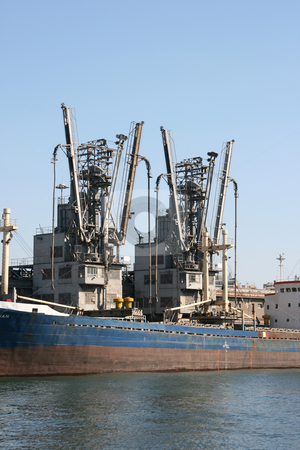 To use this stock image in your creative project, please select the size you need over to the right and click the "Add to Cart" button.
Your downloaded image will come with the Cutcaster watermark removed so don’t worry about the watermark you see on this page. Old cargo ship stock photo, Old cargo ship at dock ready for loading by EVANGELOS THOMAIDIS