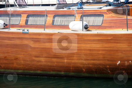To use this stock image in your creative project, please select the size you need over to the right and click the "Add to Cart" button.
Your downloaded image will come with the Cutcaster watermark removed so don’t worry about the watermark you see on this page. Sail yacht side stock photo, Side view from luxury sail yacht at marina by EVANGELOS THOMAIDIS