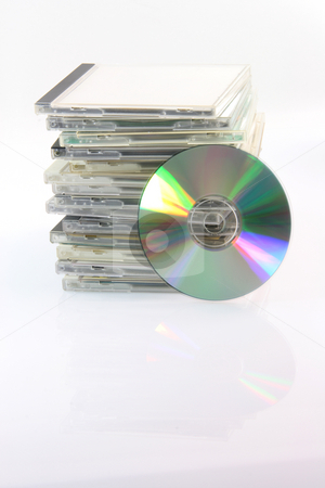 To use this stock image in your creative project, please select the size you need over to the right and click the "Add to Cart" button.
Your downloaded image will come with the Cutcaster watermark removed so don’t worry about the watermark you see on this page. Compact disc and cases stock photo, Copact disc and pile of cd cases isolated on white background and empty label to add your message by EVANGELOS THOMAIDIS