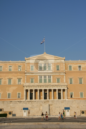 To use this stock image in your creative project, please select the size you need over to the right and click the "Add to Cart" button.
Your downloaded image will come with the Cutcaster watermark removed so don’t worry about the watermark you see on this page. Parliament and tourists stock photo, Greek parliament exterior verical shut with tourists and guards landmakrs of athens greece by EVANGELOS THOMAIDIS