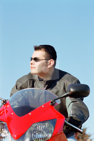 To use this stock image in your creative project, please select the size you need over to the right and click the "Add to Cart" button.
Your downloaded image will come with the Cutcaster watermark removed so don’t worry about the watermark you see on this page. MPIXIS550179 stock photo, Man on motor bike by Mpixis World