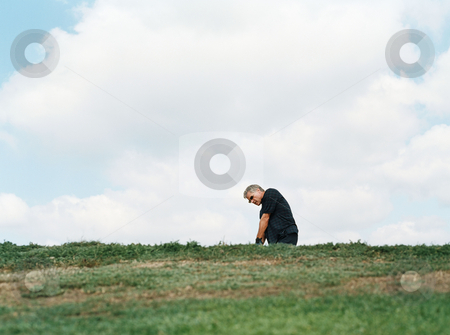 To use this stock image in your creative project, please select the size you need over to the right and click the "Add to Cart" button.
Your downloaded image will come with the Cutcaster watermark removed so don’t worry about the watermark you see on this page. Golfer in a sand trap stock photo, Golfer in a sand trap by Mpixis World