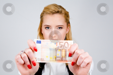 To use this stock image in your creative project, please select the size you need over to the right and click the "Add to Cart" button.
Your downloaded image will come with the Cutcaster watermark removed so don’t worry about the watermark you see on this page. Woman with fifty euros stock photo, Young blond woman holding fifty euro by Vitaly Sokolovskiy