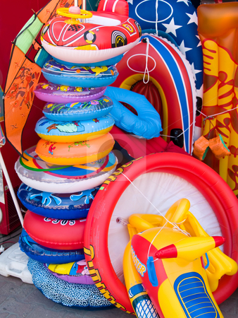 To use this stock image in your creative project, please select the size you need over to the right and click the "Add to Cart" button.
Your downloaded image will come with the Cutcaster watermark removed so don’t worry about the watermark you see on this page. Lifebuoy stock photo, Lifebuoy boats, kites children toys by Adrian Costea