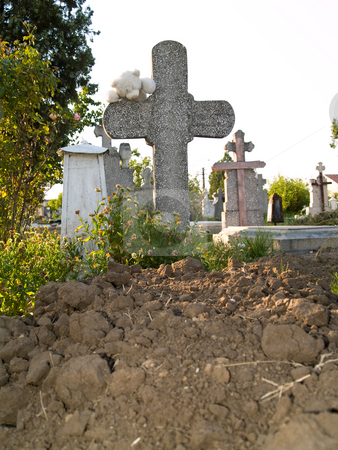 To use this stock image in your creative project, please select the size you need over to the right and click the "Add to Cart" button.
Your downloaded image will come with the Cutcaster watermark removed so don’t worry about the watermark you see on this page. Cross stock photo, Teddy bear on a cross in cemetery by Adrian Costea