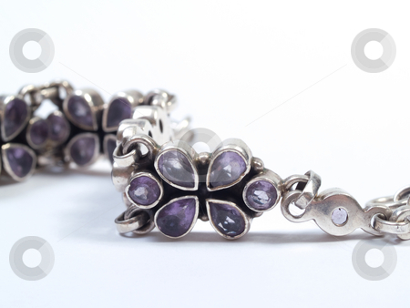 To use this stock image in your creative project, please select the size you need over to the right and click the "Add to Cart" button.
Your downloaded image will come with the Cutcaster watermark removed so don’t worry about the watermark you see on this page. Purple silver bracelet stock photo, Purple bracelet on white isolated background by Adrian Costea