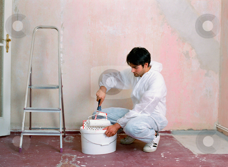 To use this stock image in your creative project, please select the size you need over to the right and click the "Add to Cart" button.
Your downloaded image will come with the Cutcaster watermark removed so don’t worry about the watermark you see on this page. MPIXIS574031 stock photo, Man decorating a room by Mpixis World