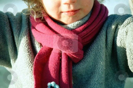 To use this stock image in your creative project, please select the size you need over to the right and click the "Add to Cart" button.
Your downloaded image will come with the Cutcaster watermark removed so don’t worry about the watermark you see on this page. Winter scarf stock photo, Child in red scarf by Mpixis World