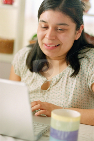 To use this stock image in your creative project, please select the size you need over to the right and click the "Add to Cart" button.
Your downloaded image will come with the Cutcaster watermark removed so don’t worry about the watermark you see on this page. MPIXIS550181 stock photo, Woman happily at work on laptop by Mpixis World
