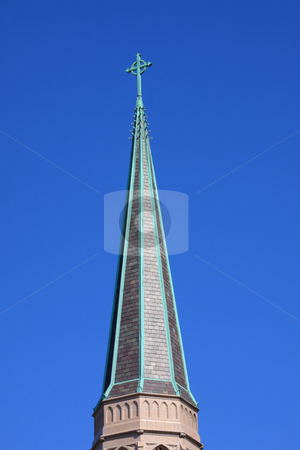 To use this stock image in your creative project, please select the size you need over to the right and click the "Add to Cart" button.
Your downloaded image will come with the Cutcaster watermark removed so don’t worry about the watermark you see on this page. Church Steeple stock photo, Church steeple with cross on blue sky background. by Steve Stedman