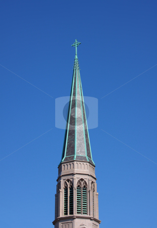 To use this stock image in your creative project, please select the size you need over to the right and click the "Add to Cart" button.
Your downloaded image will come with the Cutcaster watermark removed so don’t worry about the watermark you see on this page. Church Spire stock photo, Church steeple with a blue sky background. by Steve Stedman