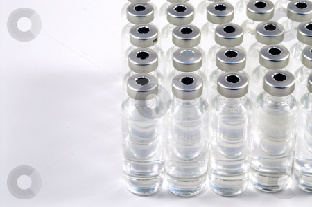 To use this stock image in your creative project, please select the size you need over to the right and click the "Add to Cart" button.
Your downloaded image will come with the Cutcaster watermark removed so don’t worry about the watermark you see on this page. Medicine Vials stock photo, A collection of prescription medicine vials. by Robert Byron