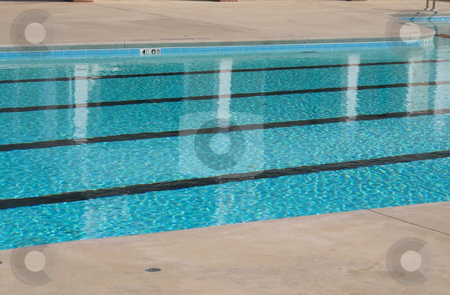 To use this stock image in your creative project, please select the size you need over to the right and click the "Add to Cart" button.
Your downloaded image will come with the Cutcaster watermark removed so don’t worry about the watermark you see on this page. Swimming Pool stock photo, A private swimming pool on a hot summers day. by Robert Byron