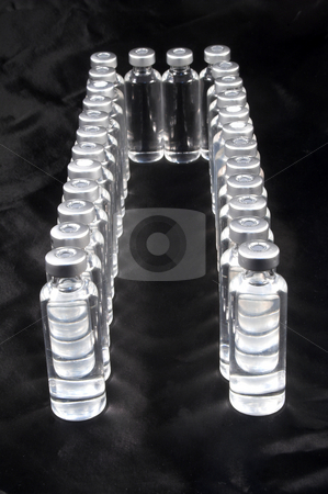 To use this stock image in your creative project, please select the size you need over to the right and click the "Add to Cart" button.
Your downloaded image will come with the Cutcaster watermark removed so don’t worry about the watermark you see on this page. Medicine Vials stock photo, A collection of prescription medicine vials. by Robert Byron