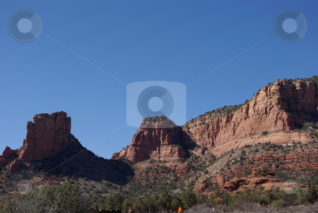 To use this stock image in your creative project, please select the size you need over to the right and click the "Add to Cart" button.
Your downloaded image will come with the Cutcaster watermark removed so don’t worry about the watermark you see on this page. Sedona, Arizona Red Rock Formations stock photo, Geological processes have been at work in Sedona, Az for over 300 million years creating unusual rock formations like those in this image. The area around Sedona is referred to as Red Rock Country and draws travelers from all over the world to view the spectacular scenery created by erosion and weathering of the desert terrain. by Dennis Thomsen