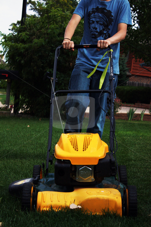 To use this stock image in your creative project, please select the size you need over to the right and click the "Add to Cart" button.
Your downloaded image will come with the Cutcaster watermark removed so don’t worry about the watermark you see on this page. Teenager doing chores stock photo, Teenager mowing the front yard as part of his summer chores. by Patrick Kay