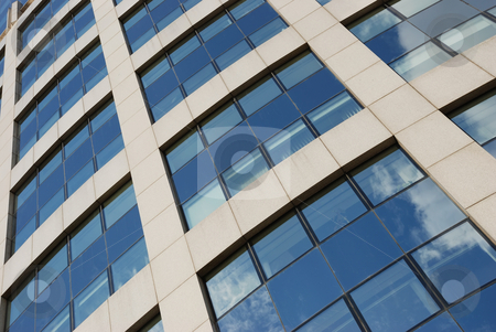 To use this stock image in your creative project, please select the size you need over to the right and click the "Add to Cart" button.
Your downloaded image will come with the Cutcaster watermark removed so don’t worry about the watermark you see on this page. Windows stock photo, Windows of a shiny skyscraper reflecting clouds by Ivan Paunovic