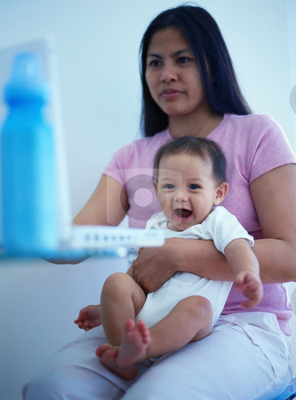 To use this stock image in your creative project, please select the size you need over to the right and click the "Add to Cart" button.
Your downloaded image will come with the Cutcaster watermark removed so don’t worry about the watermark you see on this page. MPIXIS589020 stock photo, Telecommuting mother with baby by Mpixis World