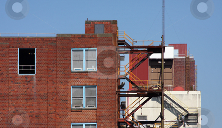To use this stock image in your creative project, please select the size you need over to the right and click the "Add to Cart" button.
Your downloaded image will come with the Cutcaster watermark removed so don’t worry about the watermark you see on this page. Industrial Buildings stock photo, Industrial buildings part of a pulp and paper mill that is being dismantled. by Steve Stedman