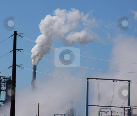 To use this stock image in your creative project, please select the size you need over to the right and click the "Add to Cart" button.
Your downloaded image will come with the Cutcaster watermark removed so don’t worry about the watermark you see on this page. Oil Refinery View stock photo, Oil refinery billowing smoke into blue sky by Steve Stedman