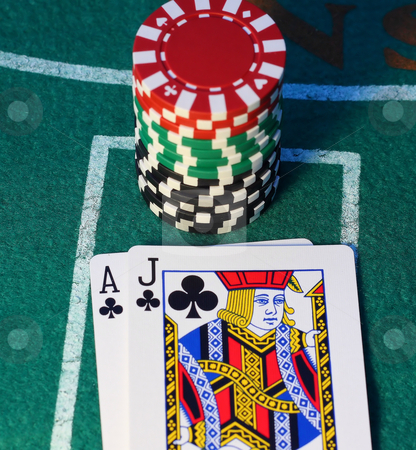 To use this stock image in your creative project, please select the size you need over to the right and click the "Add to Cart" button.
Your downloaded image will come with the Cutcaster watermark removed so don’t worry about the watermark you see on this page. Blackjack stock photo, Blackjack and a stack of chips on a felt background by Steve Stedman