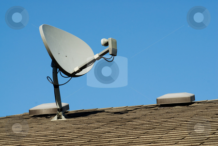 To use this stock image in your creative project, please select the size you need over to the right and click the "Add to Cart" button.
Your downloaded image will come with the Cutcaster watermark removed so don’t worry about the watermark you see on this page. Home Satellite stock photo, A small home satellite on the roof by Richard Nelson