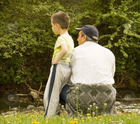 To use this stock image in your creative project, please select the size you need over to the right and click the "Add to Cart" button.
Your downloaded image will come with the Cutcaster watermark removed so don’t worry about the watermark you see on this page. Grandpa and grandson stock photo, Grandpa and grandson enjoying the sun by Ivan Paunovic