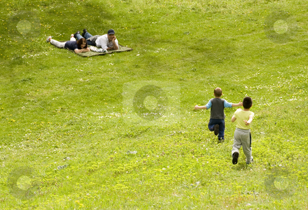 To use this stock image in your creative project, please select the size you need over to the right and click the "Add to Cart" button.
Your downloaded image will come with the Cutcaster watermark removed so don’t worry about the watermark you see on this page. Grandsons and grandparents stock photo, Two happy boys running to their grandparents by Ivan Paunovic