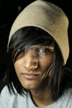 To use this stock image in your creative project, please select the size you need over to the right and click the "Add to Cart" button.
Your downloaded image will come with the Cutcaster watermark removed so don’t worry about the watermark you see on this page. Young indian man wearing beanie hat stock photo, Young indian man wearing beanie hat by Wong Chee Yen