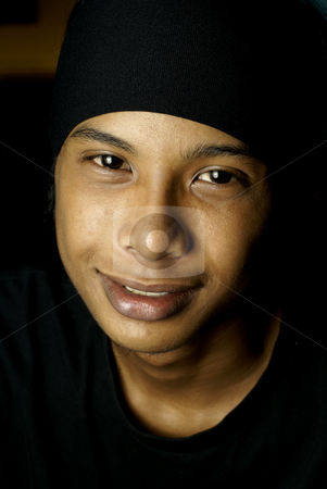 To use this stock image in your creative project, please select the size you need over to the right and click the "Add to Cart" button.
Your downloaded image will come with the Cutcaster watermark removed so don’t worry about the watermark you see on this page. Man Smiling stock photo, Youthful asian man with black beanie headwear. by Wong Chee Yen