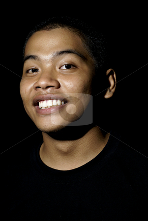 To use this stock image in your creative project, please select the size you need over to the right and click the "Add to Cart" button.
Your downloaded image will come with the Cutcaster watermark removed so don’t worry about the watermark you see on this page. Man Grinning stock photo, Young asian man portrait with toothy smile by Wong Chee Yen