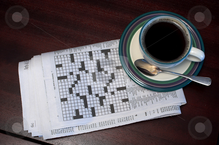 To use this stock image in your creative project, please select the size you need over to the right and click the "Add to Cart" button.
Your downloaded image will come with the Cutcaster watermark removed so don’t worry about the watermark you see on this page. Morning Coffee stock photo, Morning coffee and the newspaper crossword puzzle. by Robert Byron