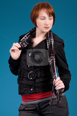 To use this stock image in your creative project, please select the size you need over to the right and click the "Add to Cart" button.
Your downloaded image will come with the Cutcaster watermark removed so don’t worry about the watermark you see on this page. Fashion with a jacket stock photo, Young red haired girl with a fashion attitude by Frenk and Danielle Kaufmann