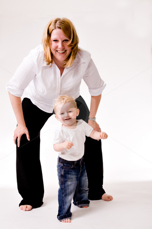 To use this stock image in your creative project, please select the size you need over to the right and click the "Add to Cart" button.
Your downloaded image will come with the Cutcaster watermark removed so don’t worry about the watermark you see on this page. Playing with mom stock photo, Cute caucasian blond toddler is happy with his mother by Frenk and Danielle Kaufmann