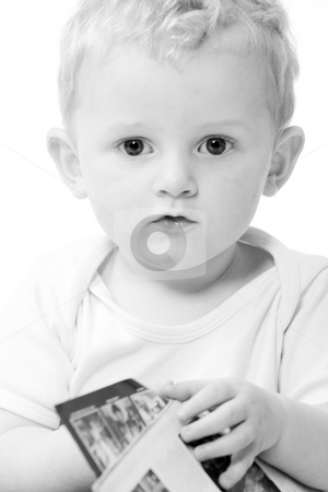 To use this stock image in your creative project, please select the size you need over to the right and click the "Add to Cart" button.
Your downloaded image will come with the Cutcaster watermark removed so don’t worry about the watermark you see on this page. Toddler portrait stock photo, Cute caucasian blond toddler ishappy and playfull by Frenk and Danielle Kaufmann