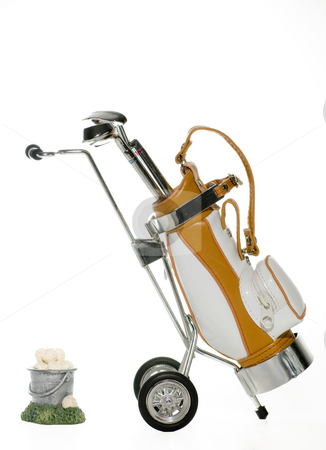 To use this stock image in your creative project, please select the size you need over to the right and click the "Add to Cart" button.
Your downloaded image will come with the Cutcaster watermark removed so don’t worry about the watermark you see on this page. Golf Bag and bucket of Balls stock photo, Golf bag and clubs with a bucket of balls isolated by Robert Cabrera