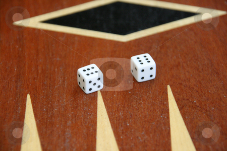 To use this stock image in your creative project, please select the size you need over to the right and click the "Add to Cart" button.
Your downloaded image will come with the Cutcaster watermark removed so don’t worry about the watermark you see on this page. Dices on backgammon stock photo, Two dices on backlgammon toys and leisure items by EVANGELOS THOMAIDIS