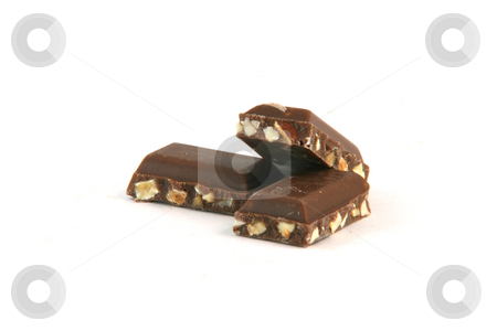 To use this stock image in your creative project, please select the size you need over to the right and click the "Add to Cart" button.
Your downloaded image will come with the Cutcaster watermark removed so don’t worry about the watermark you see on this page. Almond chocolate pieces stock photo, Three almond feel chocolate pieces closeup with copy space isolated on white background food and sweets concepts by EVANGELOS THOMAIDIS