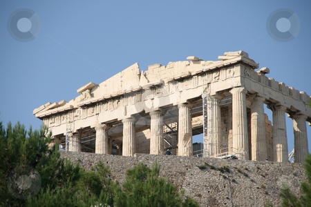 To use this stock image in your creative project, please select the size you need over to the right and click the "Add to Cart" button.
Your downloaded image will come with the Cutcaster watermark removed so don’t worry about the watermark you see on this page. Acropolis stock photo, Parthenon above trees landmarks of athens greece by EVANGELOS THOMAIDIS