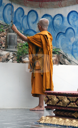 To use this stock image in your creative project, please select the size you need over to the right and click the "Add to Cart" button.
Your downloaded image will come with the Cutcaster watermark removed so don’t worry about the watermark you see on this page. Monk ringing the bell stock photo, Buddhist monks ringing the bell at big buddha temple samui island thailand by EVANGELOS THOMAIDIS