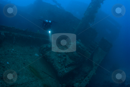 To use this stock image in your creative project, please select the size you need over to the right and click the "Add to Cart" button.
Your downloaded image will come with the Cutcaster watermark removed so don’t worry about the watermark you see on this page. Diver with Tank stock photo, A diver hovering above a Japanese Type 97 light tank, which rests on the deck of the Nippo Maru; A Japanese cargo ship sank in during the World War 2 Operation Hailstone, February 1944, in Truk (Chuuk) Lagoon, Micronesia by A Cotton Photo