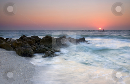 To use this stock image in your creative project, please select the size you need over to the right and click the "Add to Cart" button.
Your downloaded image will come with the Cutcaster watermark removed so don’t worry about the watermark you see on this page. Marco Sunset stock photo, A colorful sunset on the beaches of MArco Island , Florida. by Mike Dawson