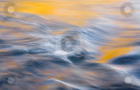 To use this stock image in your creative project, please select the size you need over to the right and click the "Add to Cart" button.
Your downloaded image will come with the Cutcaster watermark removed so don’t worry about the watermark you see on this page. Ripples of Autumn stock photo, Ripples and rapids on the Yakima River on a cold October Morning with warm light creating the color on trees reflecting from the far bank. by Mike Dawson