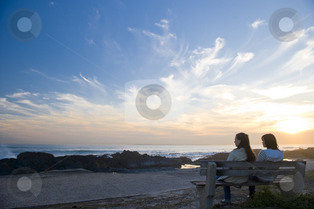 To use this stock image in your creative project, please select the size you need over to the right and click the "Add to Cart" button.
Your downloaded image will come with the Cutcaster watermark removed so don’t worry about the watermark you see on this page. Sunset over the sea stock photo, Vivid sunset over the sea with deep blue skies and bright sun spots. People are sitting on a bench overlooking the sea. by Nicolaas Traut