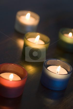To use this stock image in your creative project, please select the size you need over to the right and click the "Add to Cart" button.
Your downloaded image will come with the Cutcaster watermark removed so don’t worry about the watermark you see on this page. Tealights stock photo, A set of 5 tea light candles with a narrow depth of focus, representation of Diwali by Stephen Gibson